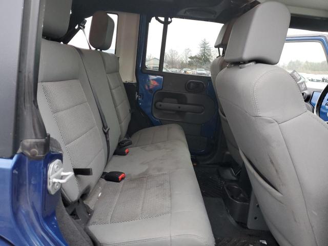 70846242 :رقم المزاد ، 1J8GA591X9L735979 vin ، 2009 Jeep Wrangler Unlimited Sahara مزاد بيع