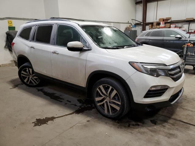Продажа на аукционе авто 2017 Honda Pilot Touring, vin: 5FNYF6H92HB500018, номер лота: 82075223