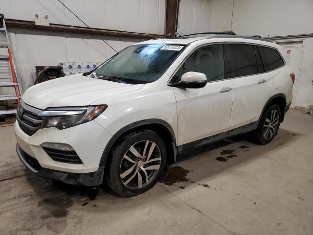 Продажа на аукционе авто 2017 Honda Pilot Touring, vin: 5FNYF6H92HB500018, номер лота: 82075223