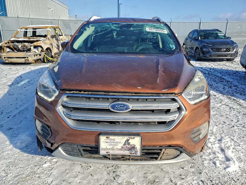 Продажа на аукционе авто 2017 Ford Escape, vin: 1FMCU9J93HUE40572, номер лота: 99756695