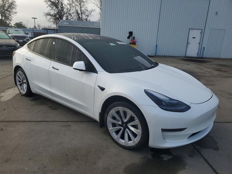 Продажа на аукционе авто 2022 Tesla Model 3, vin: 5YJ3E1EB0NF143960, номер лота: 99099335