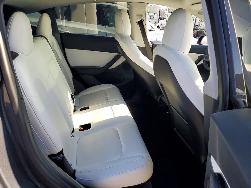 98347545 :رقم المزاد ، 5YJYGDEE0MF061110 vin ، 2021 Tesla Model Y مزاد بيع