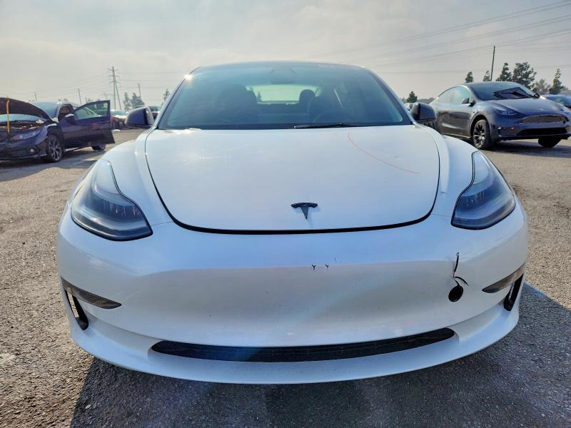 Продажа на аукционе авто 2023 Tesla Model 3, vin: 5YJ3E1EAXPF409351, номер лота: 74199465