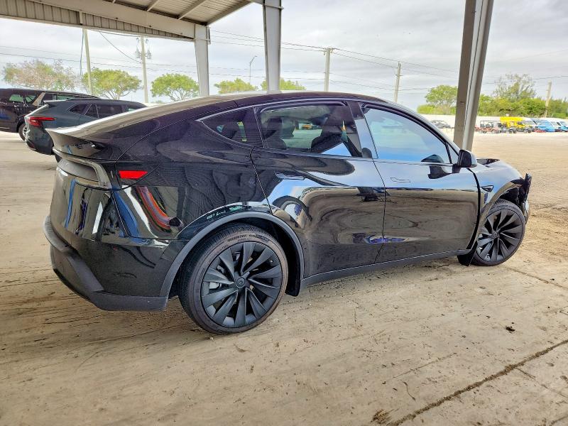 99020865 :رقم المزاد ، 7SAYGDED7TA450154 vin ، 2026 Tesla Model Y مزاد بيع