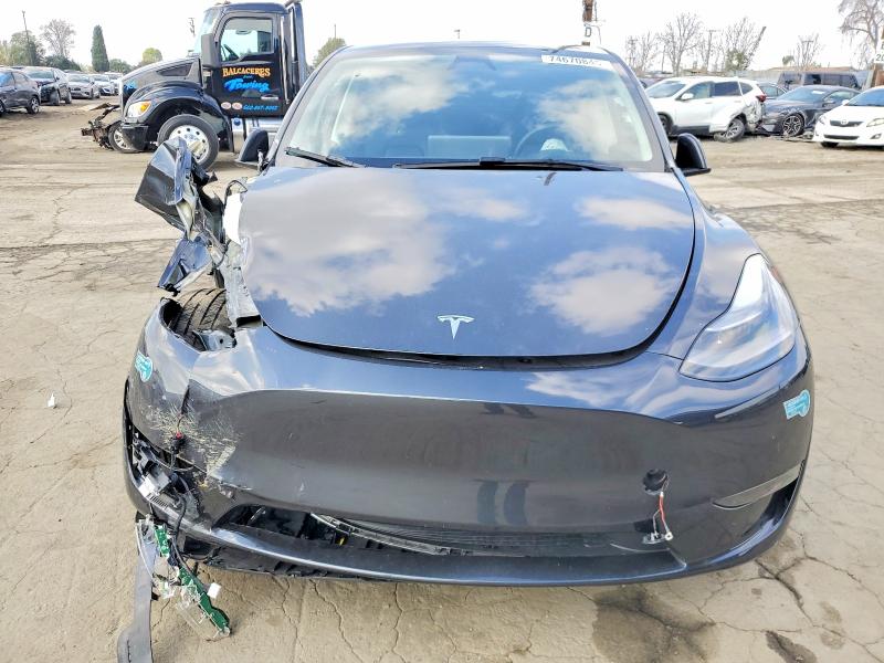 74670845 :رقم المزاد ، 7SAYGAEE1SF302445 vin ، 2025 Tesla Model Y مزاد بيع
