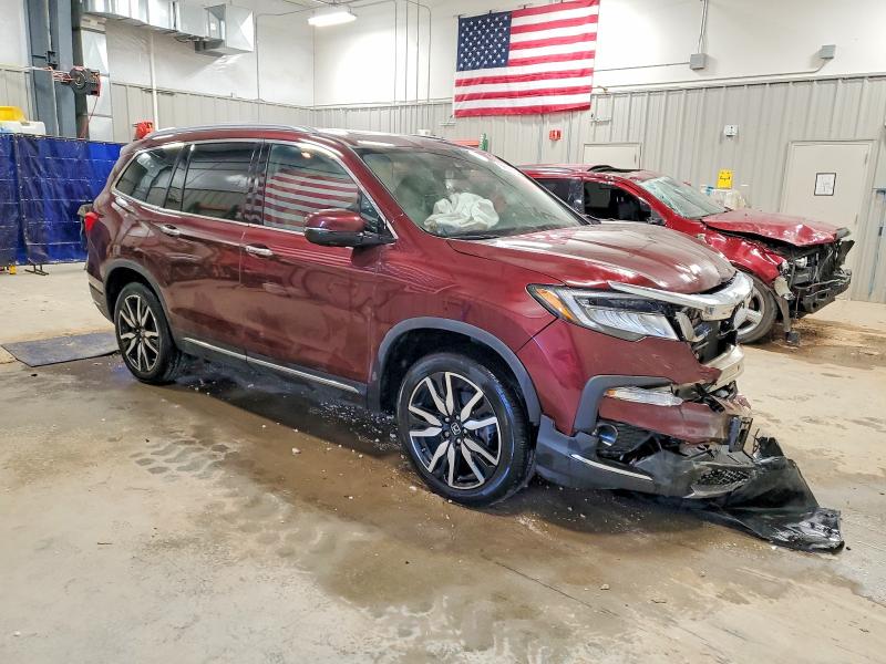 Продажа на аукционе авто 2022 Honda Pilot Elit, vin: 5FNYF6H06NB074847, номер лота: 99852215
