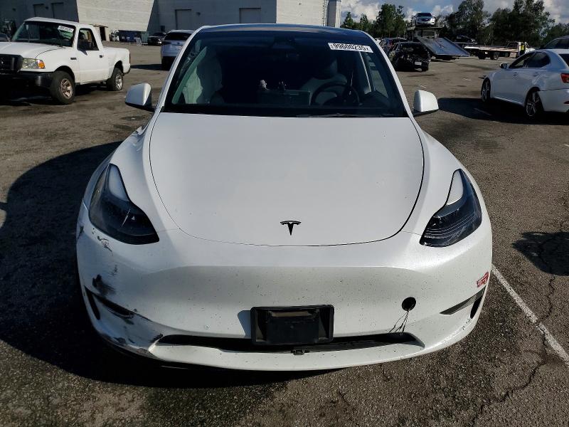99600235 :رقم المزاد ، 7SAYGDEF0PF589567 vin ، 2023 Tesla Model Y مزاد بيع