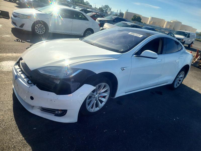 Продажа на аукционе авто 2014 Tesla Model S, vin: 5YJSA1H17EFP37763, номер лота: 99661025