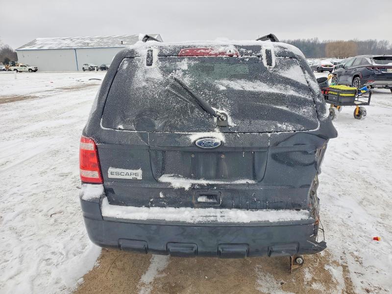 99089335 :رقم المزاد ، 1FMCU0D70AKD44129 vin ، 2010 Ford Escape مزاد بيع