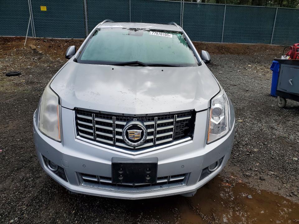 Продажа на аукционе авто 2013 Cadillac Srx, vin: 3GYFNJE32DS637016, номер лота: 77870195