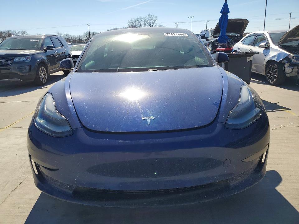 Продажа на аукционе авто 2021 Tesla Model 3, vin: 5YJ3E1EAXMF986957, номер лота: 77921685