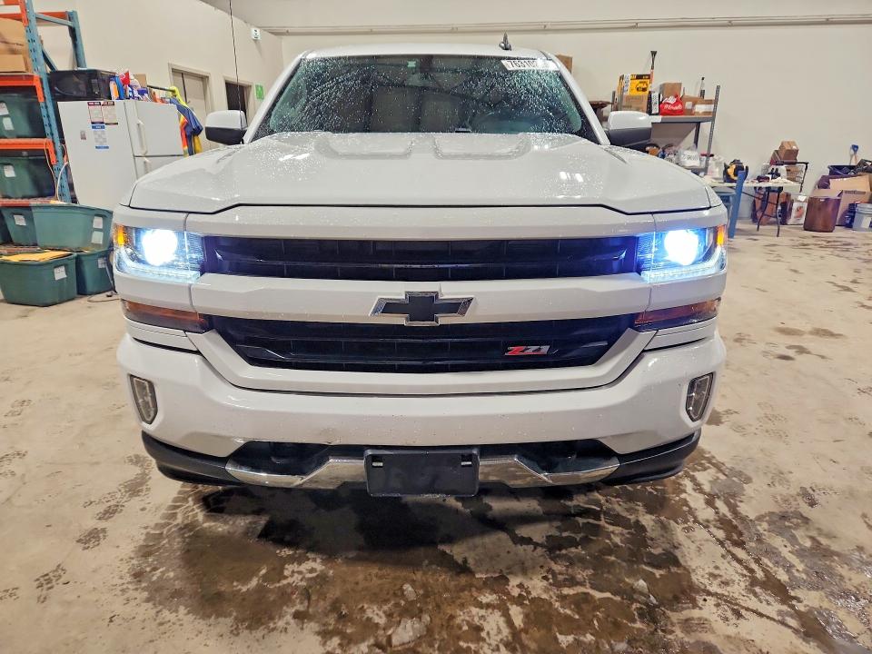 Продажа на аукционе авто 2018 Chevrolet Silverado, vin: 3GCUKREC9JG475971, номер лота: 76310275