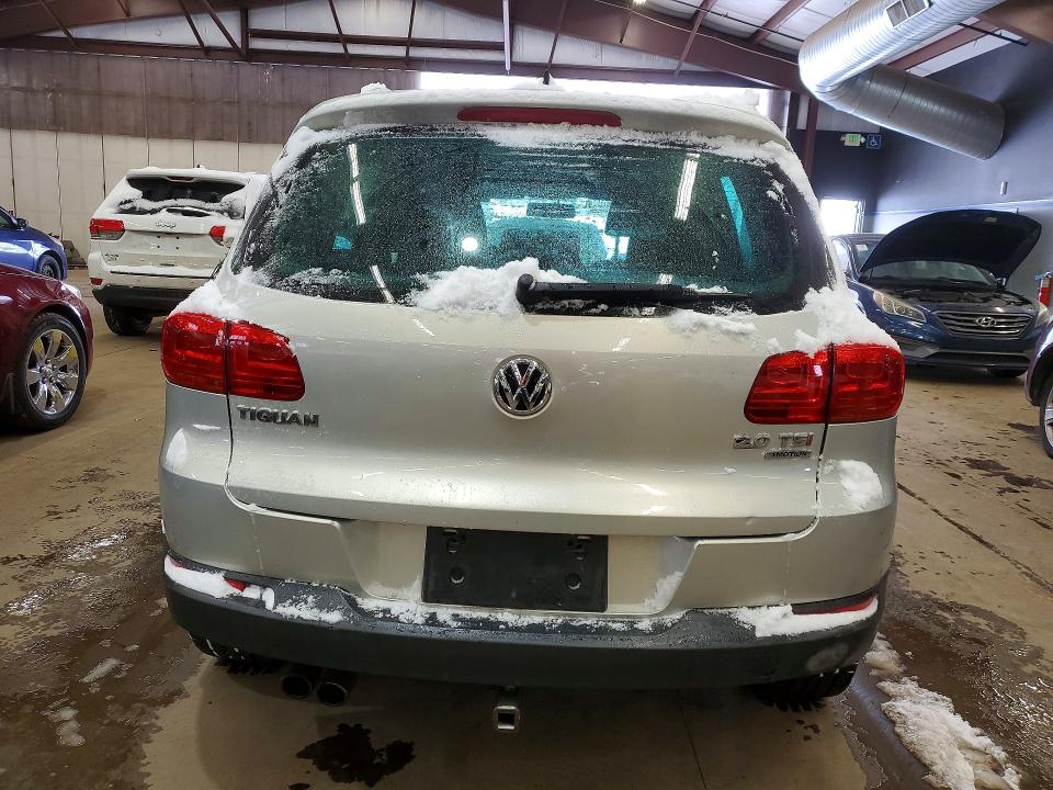 2012 Volkswagen Tiguan მანქანა იყიდება აუქციონზე, vin: WVGBV7AX4CW597407, აუქციონის ნომერი: 79079585