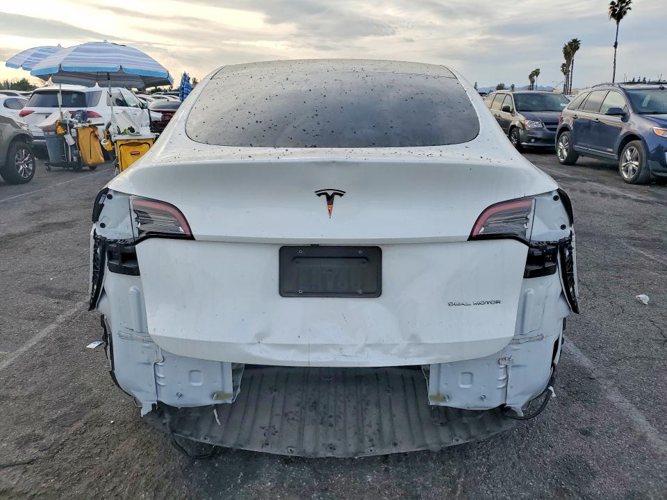 76266975 :رقم المزاد ، 5YJYGDEE0MF231854 vin ، 2021 Tesla Model Y مزاد بيع