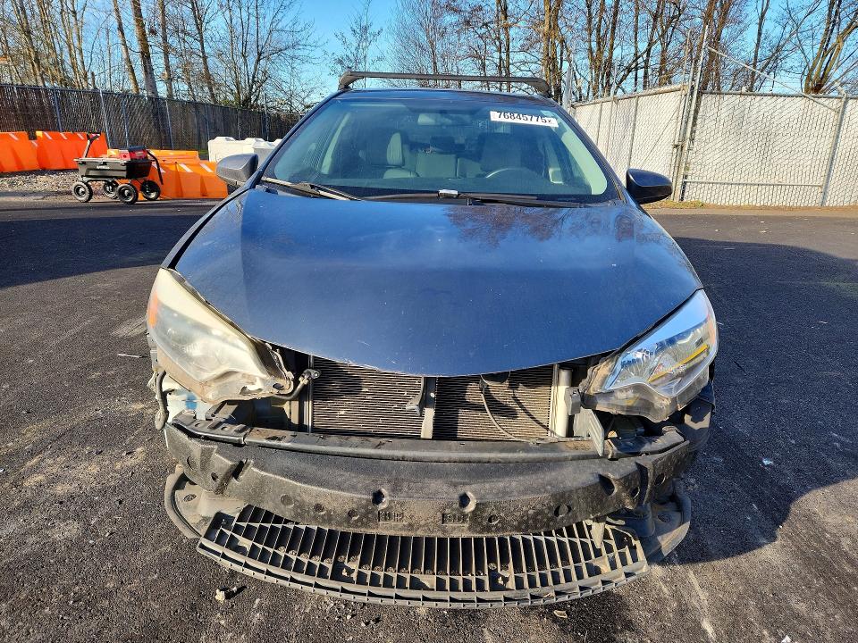 76845775 :رقم المزاد ، 5YFBURHE7EP085658 vin ، 2014 Toyota Corolla مزاد بيع