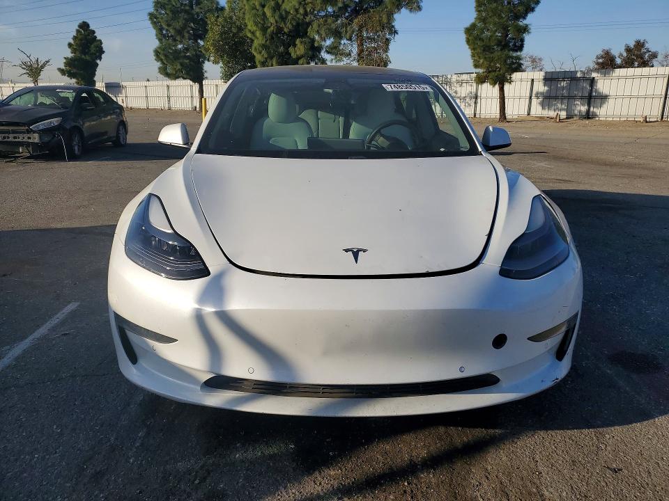 Продажа на аукционе авто 2021 Tesla Model 3, vin: 5YJ3E1EB6MF053484, номер лота: 74850515
