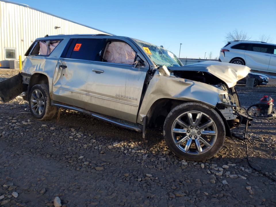 Продаж на аукціоні авто 2015 Chevrolet Suburban, vin: 1GNSKKKC8FR696219, номер лоту: 77104005