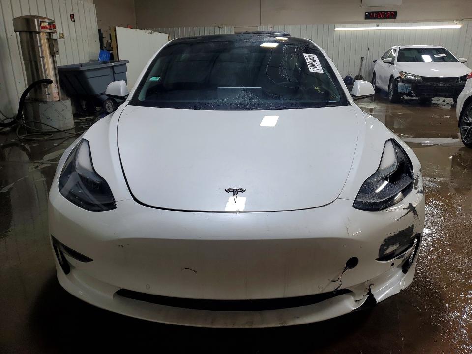 Продажа на аукционе авто 2022 Tesla Model 3, vin: 5YJ3E1EB4NF182423, номер лота: 74964835