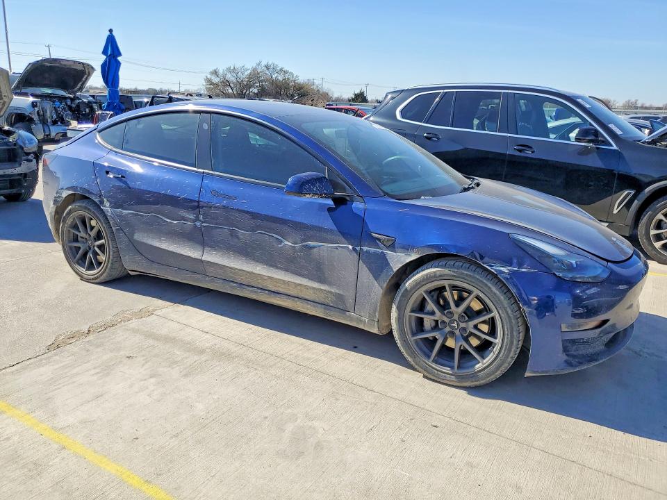 Продажа на аукционе авто 2021 Tesla Model 3, vin: 5YJ3E1EAXMF986957, номер лота: 77921685
