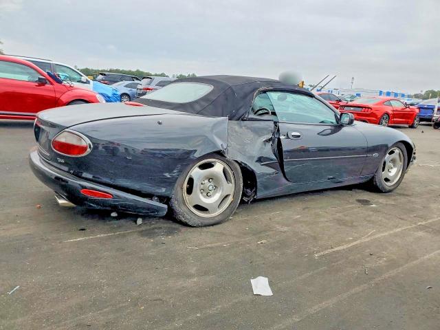 76982535 :رقم المزاد ، SAJGX2041XC035598 vin ، 1999 Jaguar Xk8 مزاد بيع
