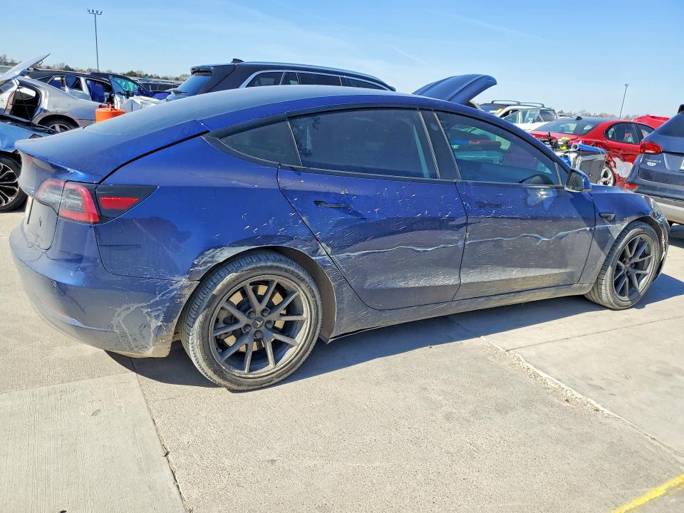 Продажа на аукционе авто 2021 Tesla Model 3, vin: 5YJ3E1EAXMF986957, номер лота: 77921685