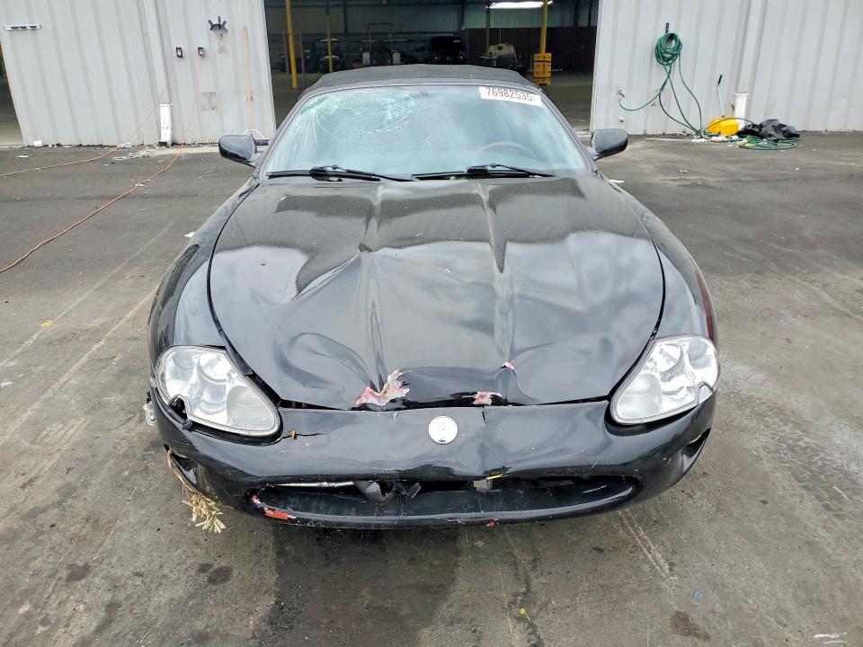 76982535 :رقم المزاد ، SAJGX2041XC035598 vin ، 1999 Jaguar Xk8 مزاد بيع