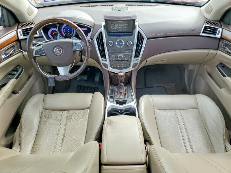 Продажа на аукционе авто 2012 Cadillac Srx, vin: 3GYFNBE30CS516697, номер лота: 77556895