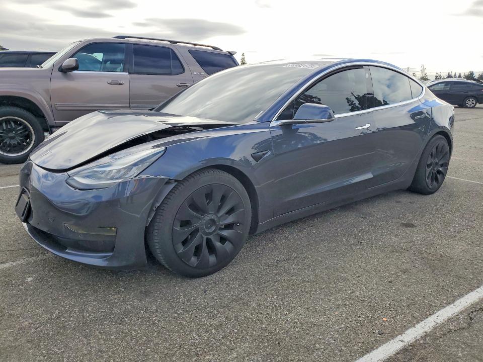 Продажа на аукционе авто 2018 Tesla Model 3, vin: 5YJ3E1EAXJF025660, номер лота: 76992475