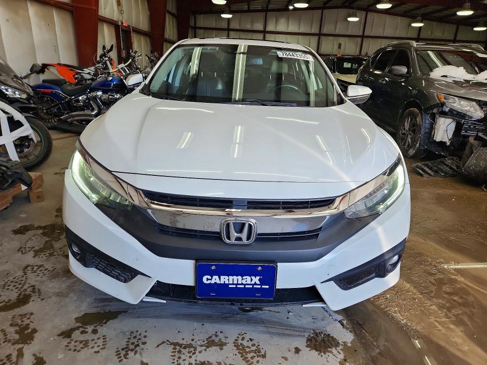 Auction sale of the 2018 Honda Civic, vin: JHMFC1F95JX037937, lot number: 78443355