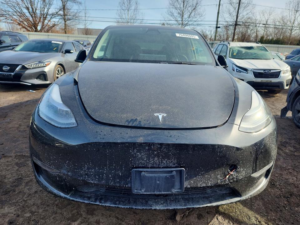76406605 :رقم المزاد ، 7SAYGDEE1PF687739 vin ، 2023 Tesla Model Y مزاد بيع