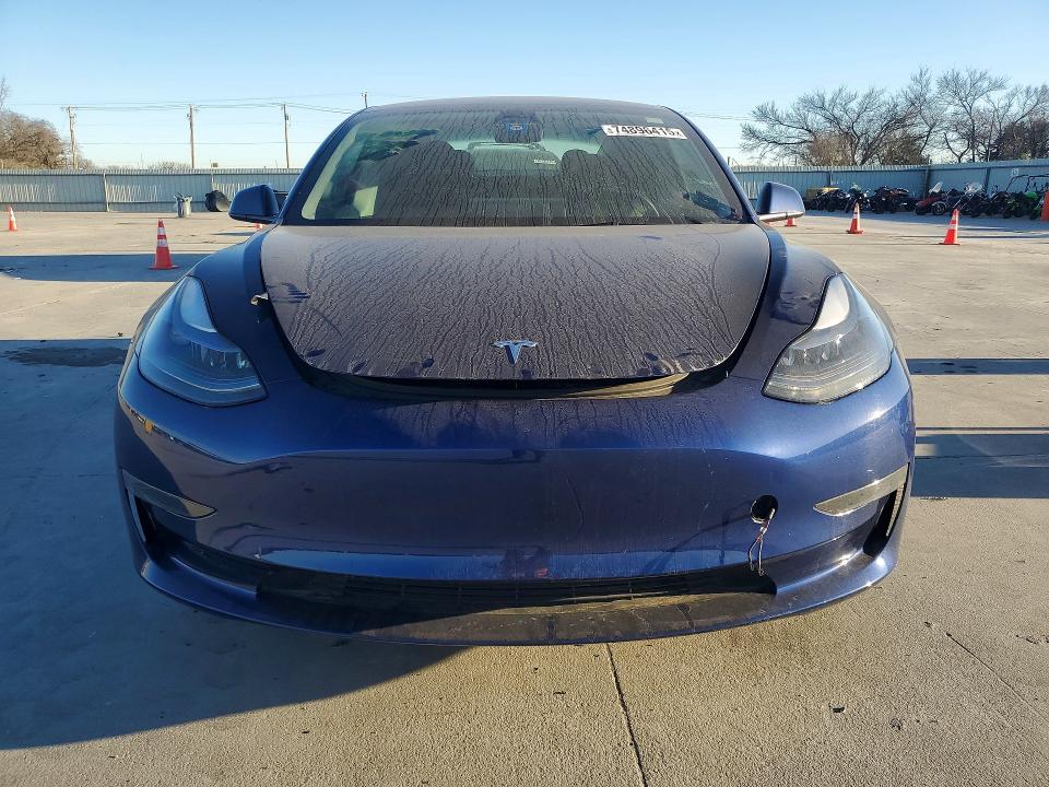 Продажа на аукционе авто 2023 Tesla Model 3, vin: 5YJ3E1EAXPF565003, номер лота: 74896415