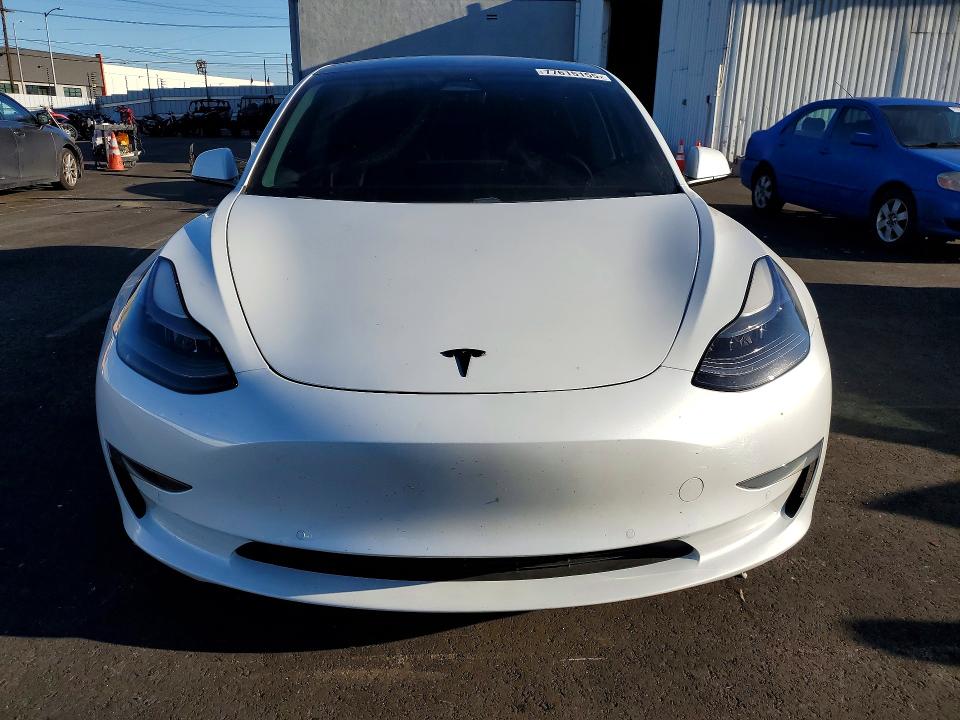Продажа на аукционе авто 2021 Tesla Model 3, vin: 5YJ3E1EA7MF070009, номер лота: 77615155