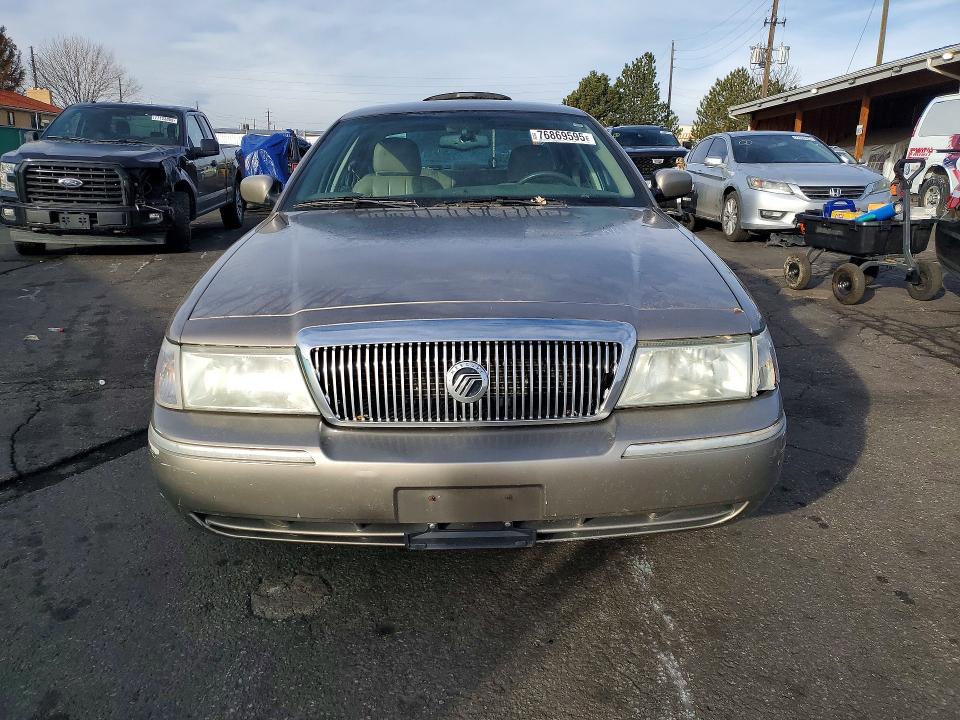 2003 Mercury Grand Marquis მანქანა იყიდება აუქციონზე, vin: 2MEFM75W53X710049, აუქციონის ნომერი: 76869595
