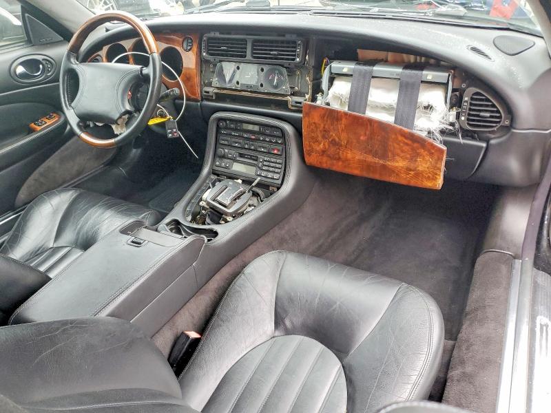 76982535 :رقم المزاد ، SAJGX2041XC035598 vin ، 1999 Jaguar Xk8 مزاد بيع