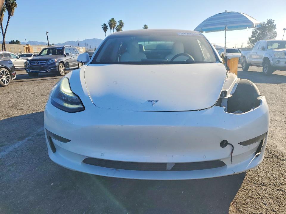 Продажа на аукционе авто 2019 Tesla Model 3, vin: 5YJ3E1EAXKF486892, номер лота: 75620925