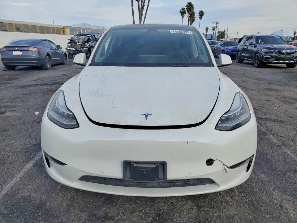 76266975 :رقم المزاد ، 5YJYGDEE0MF231854 vin ، 2021 Tesla Model Y مزاد بيع