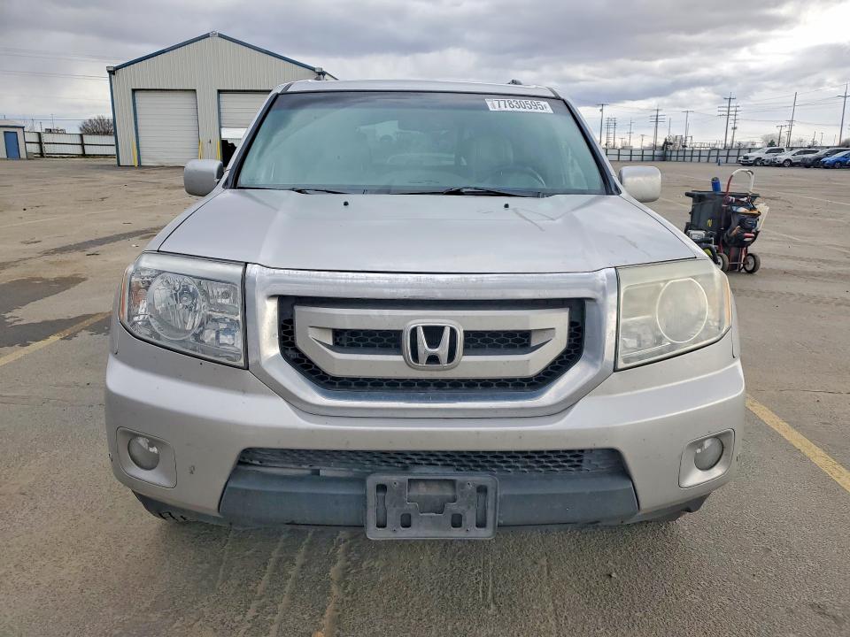 77830595 :رقم المزاد ، 5FNYF4H95BB068651 vin ، 2011 Honda Pilot مزاد بيع