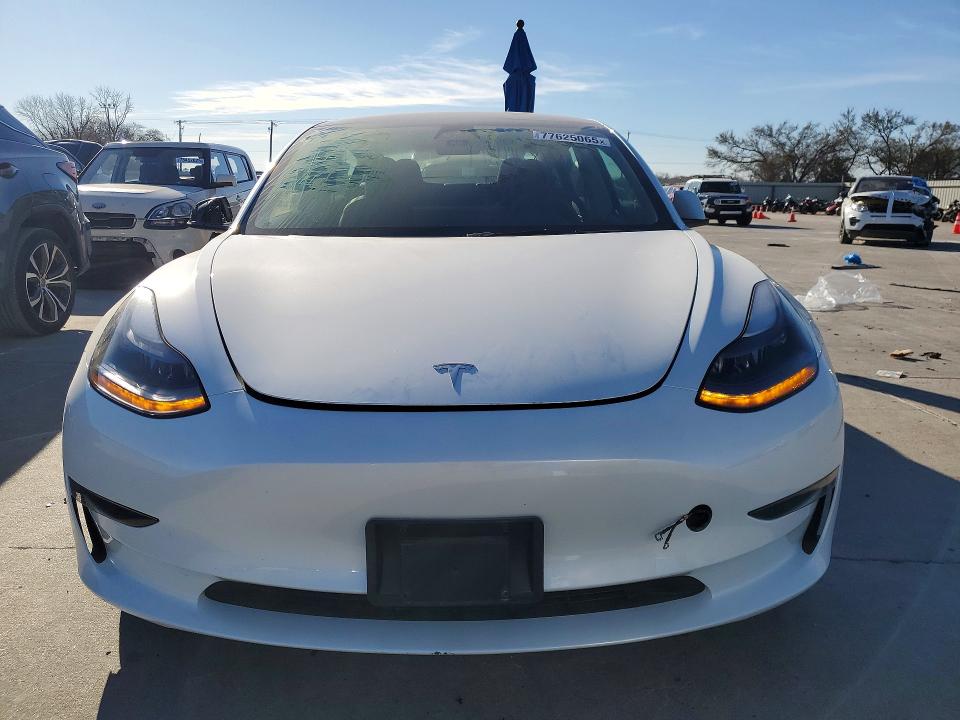 Продажа на аукционе авто 2023 Tesla Model 3, vin: 5YJ3E1EA5PF585062, номер лота: 77625065