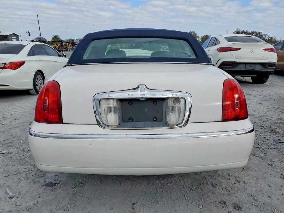 49892986 :رقم المزاد ، 1LNHM82W9XY648290 vin ، 1999 Lincoln Town Car مزاد بيع