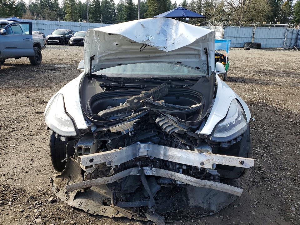 Продажа на аукционе авто 2018 Tesla Model 3, vin: 5YJ3E1EA5JF019765, номер лота: 76598555
