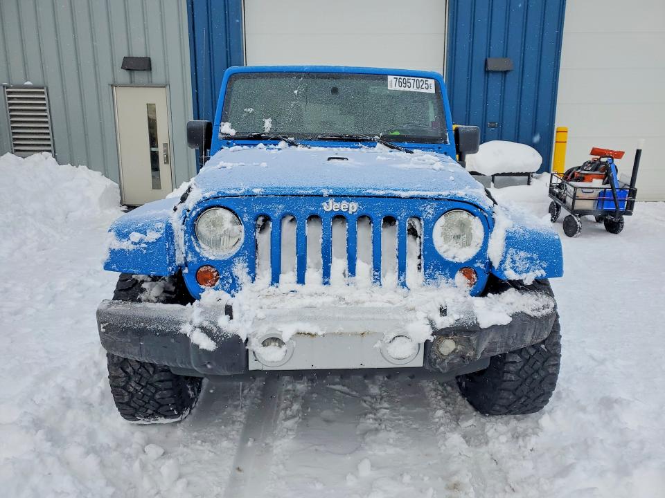 2011 Jeep Wrangler Unlimited მანქანა იყიდება აუქციონზე, vin: 1J4BA5H13BL587645, აუქციონის ნომერი: 76957025