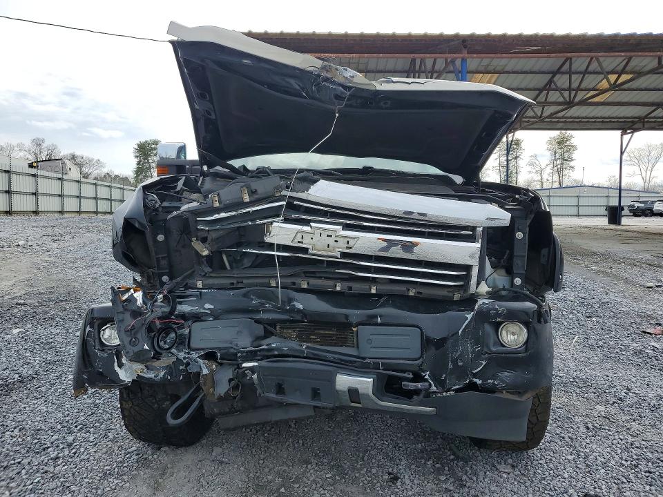 76860975 :رقم المزاد ، 1GC1KXE87FF673458 vin ، 2015 Chevrolet Silverado مزاد بيع
