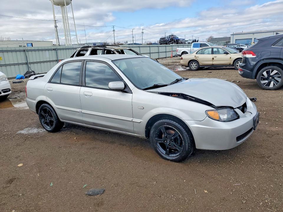 47609756 :رقم المزاد ، JM1BJ225X30106776 vin ، 2003 Mazda Protege مزاد بيع