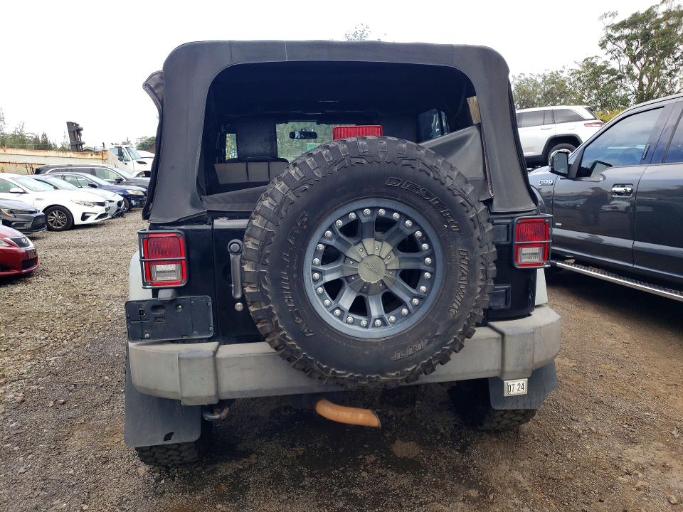 Auction sale of the 2010 Jeep Wrangler Unlimited, vin: 1J4BB3H17AL209585, lot number: 76658135