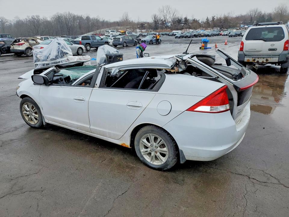 Продажа на аукционе авто 2010 Honda Insight, vin: JHMZE2H73AS012881, номер лота: 79013415