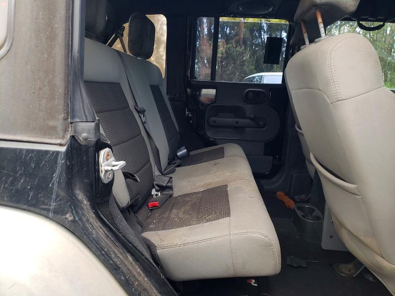 Auction sale of the 2010 Jeep Wrangler Unlimited, vin: 1J4BB3H17AL209585, lot number: 76658135