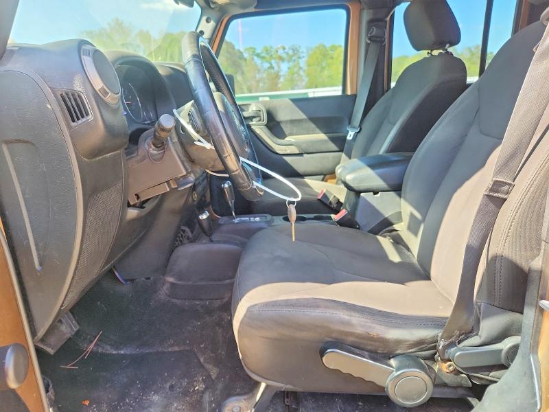 Auction sale of the 2015 Jeep Wrangler Unlimited, vin: 1C4BJWDG3FL654496, lot number: 79771815