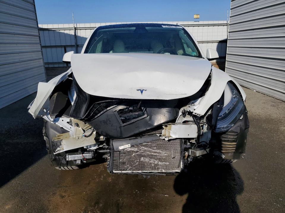 46734816 :رقم المزاد ، 5YJYGDED5MF132860 vin ، 2021 Tesla Model Y مزاد بيع