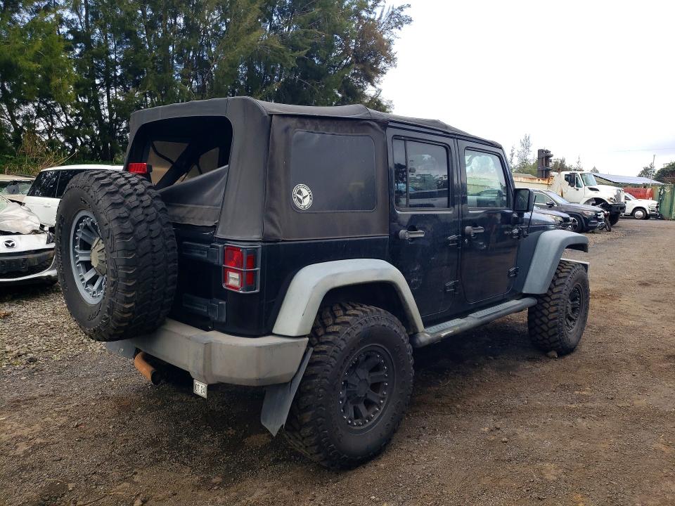 Auction sale of the 2010 Jeep Wrangler Unlimited, vin: 1J4BB3H17AL209585, lot number: 76658135
