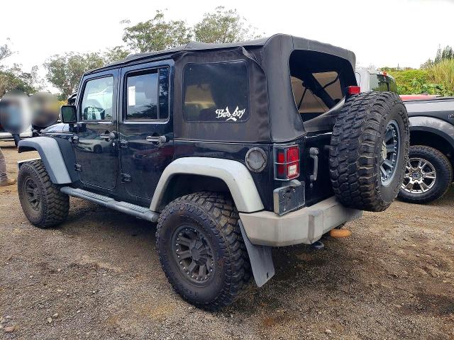 Auction sale of the 2010 Jeep Wrangler Unlimited, vin: 1J4BB3H17AL209585, lot number: 76658135